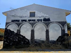 Muurschildering op een gevel in Narcao op Sardinië